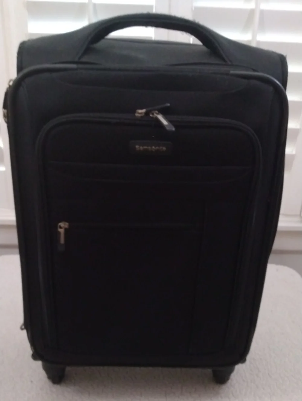 Samsonite Black Swivel Roller Carry On Suitcase